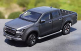 Gray diecast pickup truck model, front-left three-quarter view