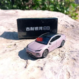 Pink Geely Galaxy E8 diecast model car, front 3/4 view with black grille