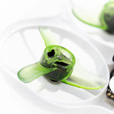 Green plastic drone propeller with black hub, 2-blade replacement prop