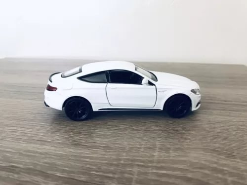 AMG C63 S coupe diecast car, white, side view, 1:36 scale