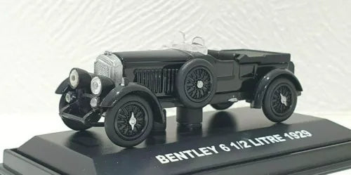 Dark gray Bentley diecast model car with four wheels; base reads 6 1/2 Litre 1929