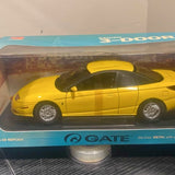 Yellow 1:18 scale diecast sports model car, side view
