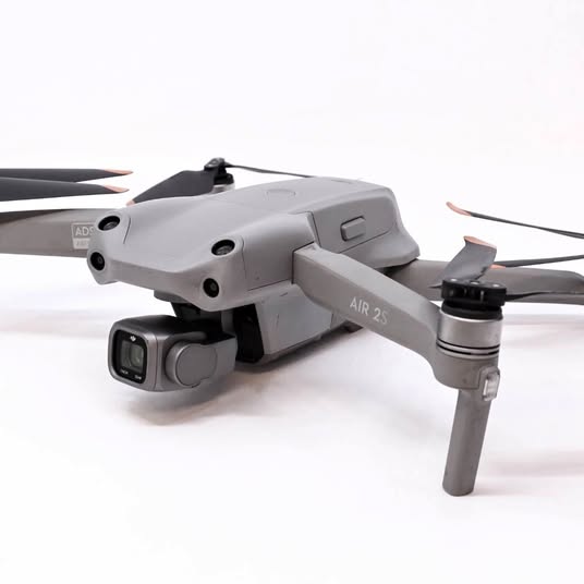 DJI Mavic Air 2S drone with front gimbal camera and folded gray propellers
