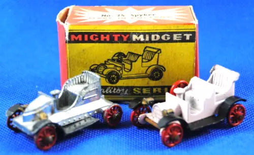 Vintage diecast Mighty Midget car models with parts, shown with original box