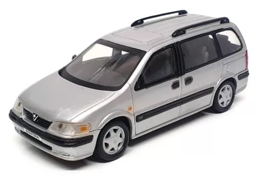 Silver diecast station wagon model with black wheels and roof rack detail