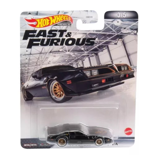 Hot Wheels 1:64 diecast Pontiac Firebird in dark black with gold wheels