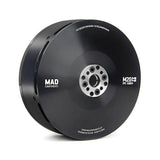 Black drone motor with center mounting plate and circular bolt holes, labeled M20MI 100KV