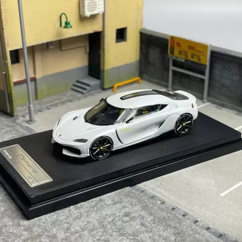 1/64 scale white diecast sports car model with black wheels on display base