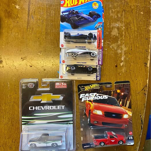 Hot Wheels Fast & Furious diecast car in blister pack, red car with black hood