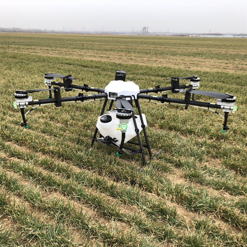 Agricultural crop sprayer drone with multi-rotor frame and spray nozzles, field-ready