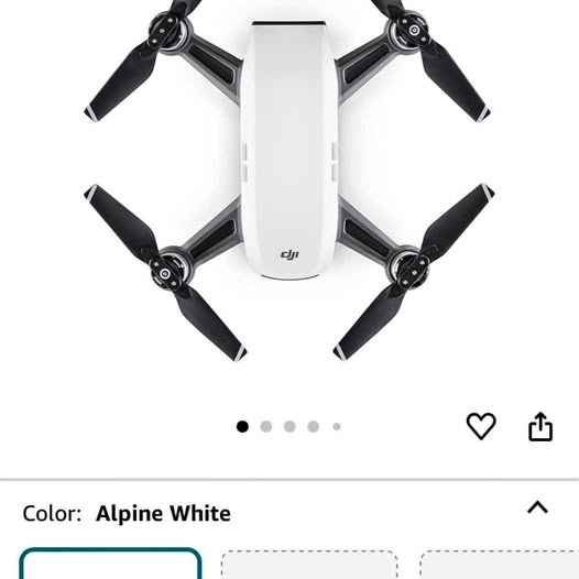 DJI Spark camera drone in Alpine White with four folded black propellers