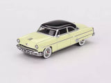 Diecast 1954 Lincoln Capri model car, light yellow with black roof, 1:64