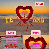 Red flower heart proposal display with chairs and glowing sign “Be my Girlfriend”