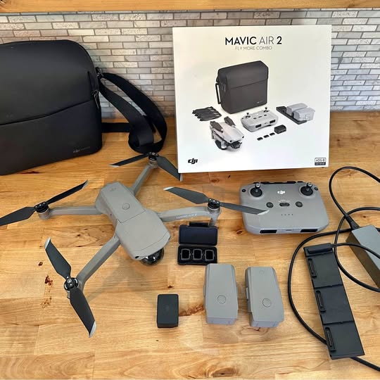 DJI Mavic Air 2 Fly More Combo drone with controller, spare batteries, and case