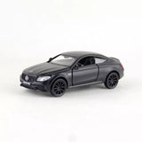 Diecast toy car model of a dark gray coupe, detailed wheels and headlights