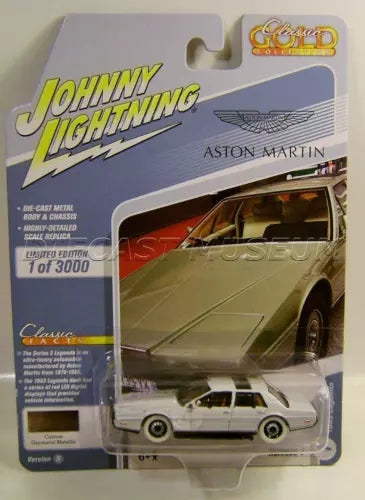 Gold Aston Martin Lagonda diecast car with white wheels, in blister packaging