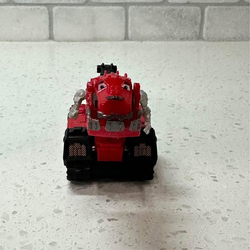 Red and black diecast dinosaur vehicle toy figure with treads and front face