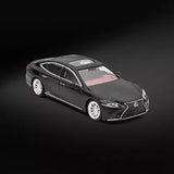 Black luxury sedan diecast model car, front 3/4 view, metal finish, L emblem