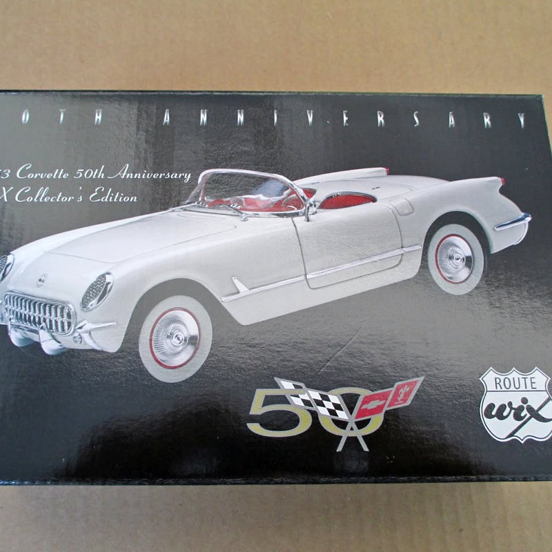 1953 Corvette diecast car, light gray with red interior, front 3/4 view