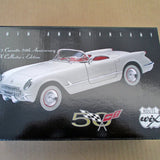 1953 Corvette diecast car, light gray with red interior, front 3/4 view