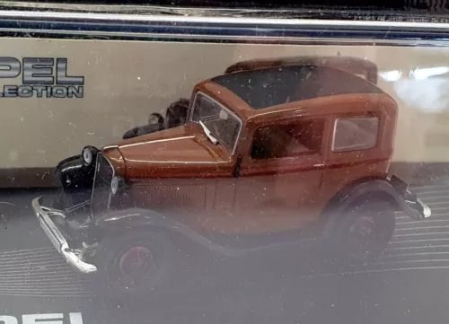 Eaglemoss 1/43 diecast car model of a brown and black Opel P4 (front view)