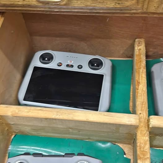 Gray drone controller with built-in screen and two antennas