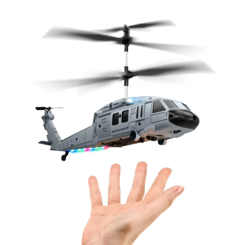 Foldable quadcopter drone with dual camera, grey blue camouflage, spinning propellers