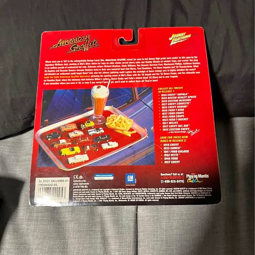 Diecast car set in red blister packaging with display tray and mini cars