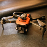 Orange quadcopter drone with front camera and four propeller arms
