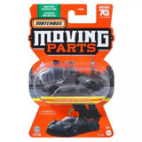 Metal diecast car model in blister pack, black roadster with moving parts