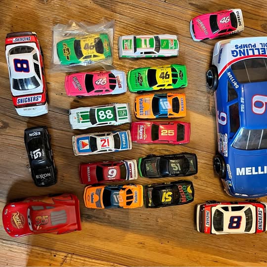 Assorted NASCAR diecast race cars, mixed colors and numbers, loose collection