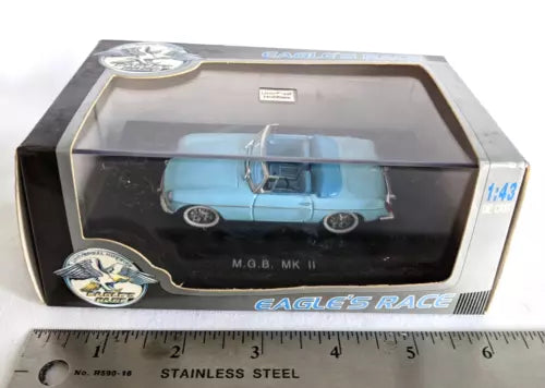 Light blue diecast convertible sports car, MG B Mk II, in display box