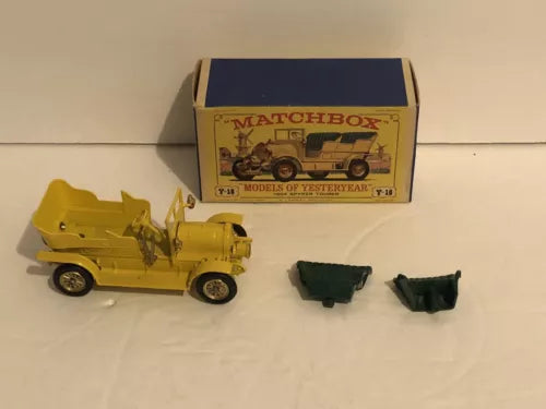 Matchbox diecast model vehicle in yellow with box and included parts