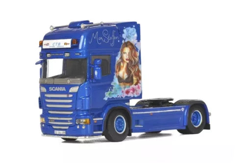Blue Scania-style diecast truck cab with front grille and side graphic, 1/50 scale