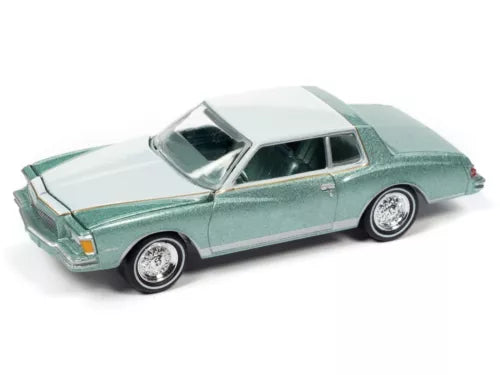 Mint green 1979 Chevy Monte Carlo diecast car with white roof, detailed wheels.