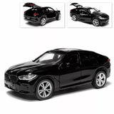 BMW X6 diecast model car, black SUV with front 3/4 view and silver wheels
