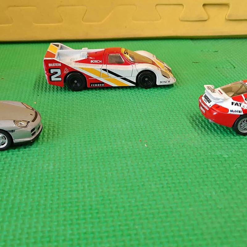 1/43 scale diecast race car, white with red accents and #2 decals
