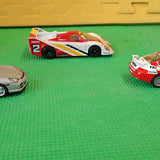 1/43 scale diecast race car, white with red accents and #2 decals