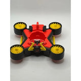 Remote-controlled toy drone with red body and four yellow propellers