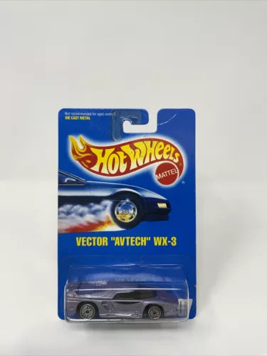 Hot Wheels diecast Vector Avtech WX-3 car on card, dark gray with gold accents