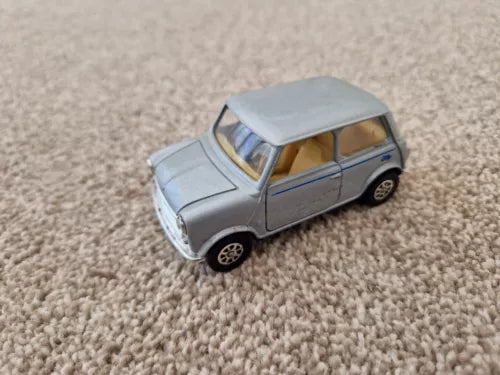 Silver 1:36 Mini Cooper diecast model car, side view