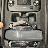 Holy Stone drone in hard shell case, folded arms and propellers visible