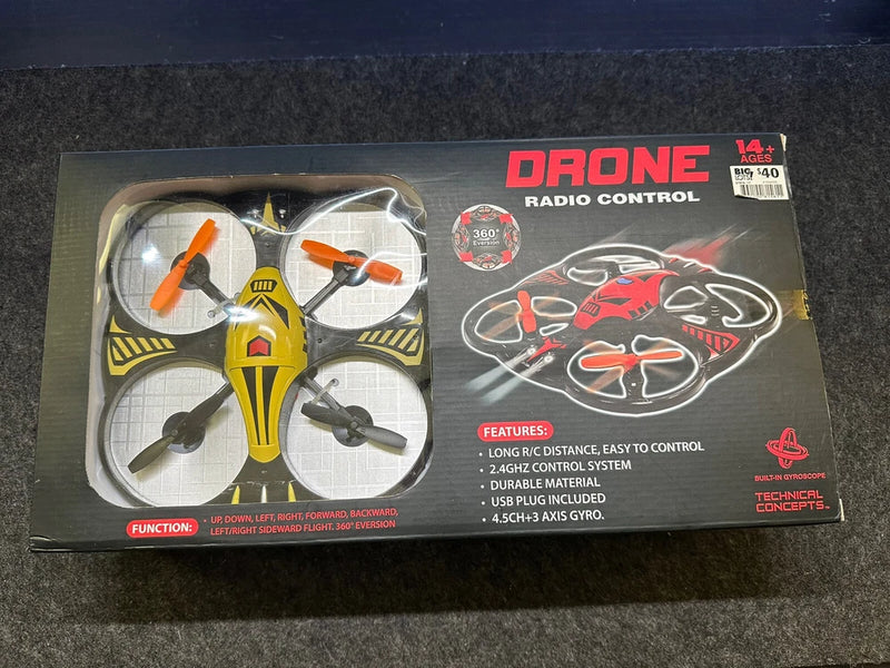 Radio controlled drone toy in retail box, with controller and propeller graphic