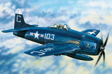 Dark blue military aircraft model with star markings, cockpit and propeller nose