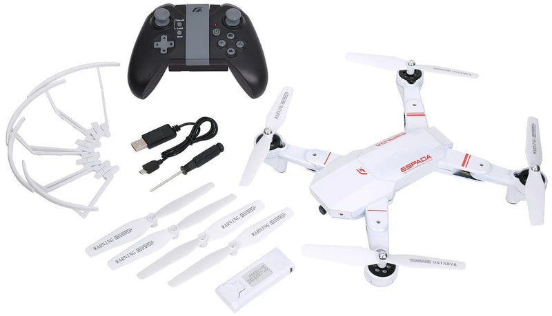 FPV drone quadcopter kit with controller, spare props, and charging accessories