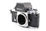 Nikon F2 Photomic silver 35mm SLR film camera with black leatherette grip, front lens mount