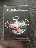 Mini drone in retail box, white frame with red propellers, 4-rotor design