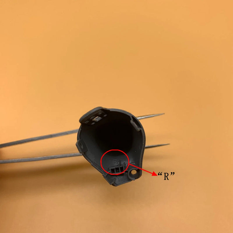 Black plastic drone arm stand bracket with mounting nub and prongs
