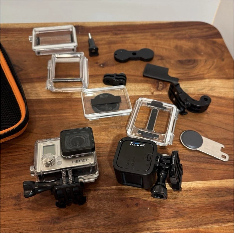 GoPro HERO3 action camera bundle with black camera, waterproof cases, mounts and accessories