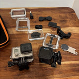 GoPro HERO3 action camera bundle with black camera, waterproof cases, mounts and accessories
